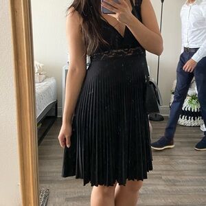 Elegant Black Sleeveless Dress with Lace Detail